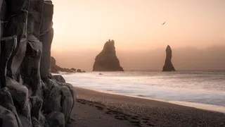 A landmark on the south coast at Camping Island: Reynisfjara Beach with Volcano Sand